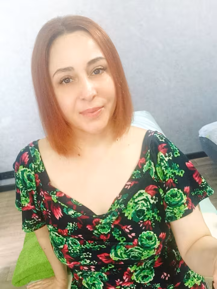 Мила