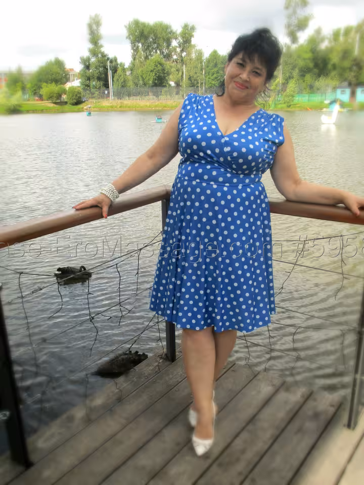 Мила